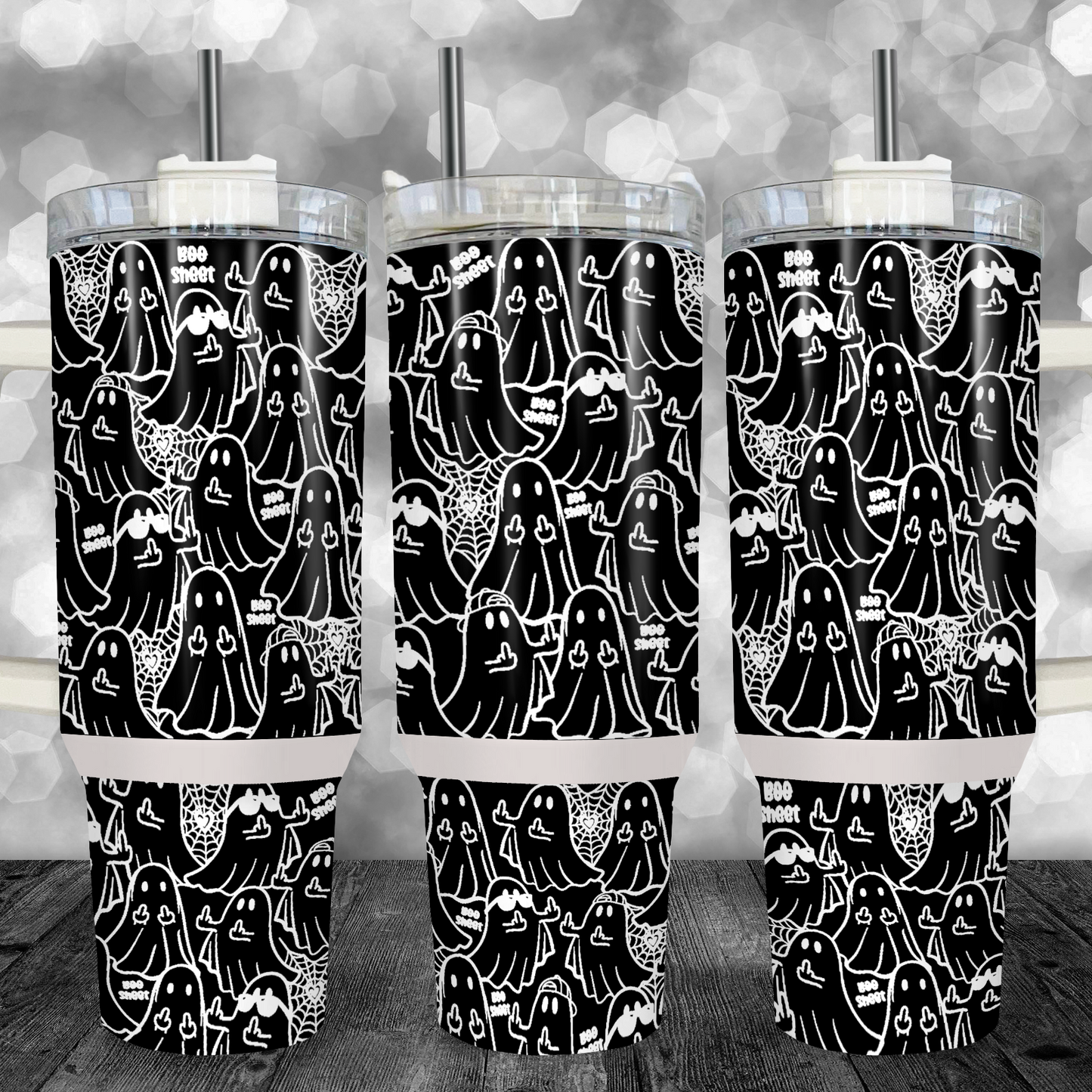 "40oz black Halloween tumbler with funny white ghost pattern and 'Boo Sheet' text, comes with handle, lid, and straw."