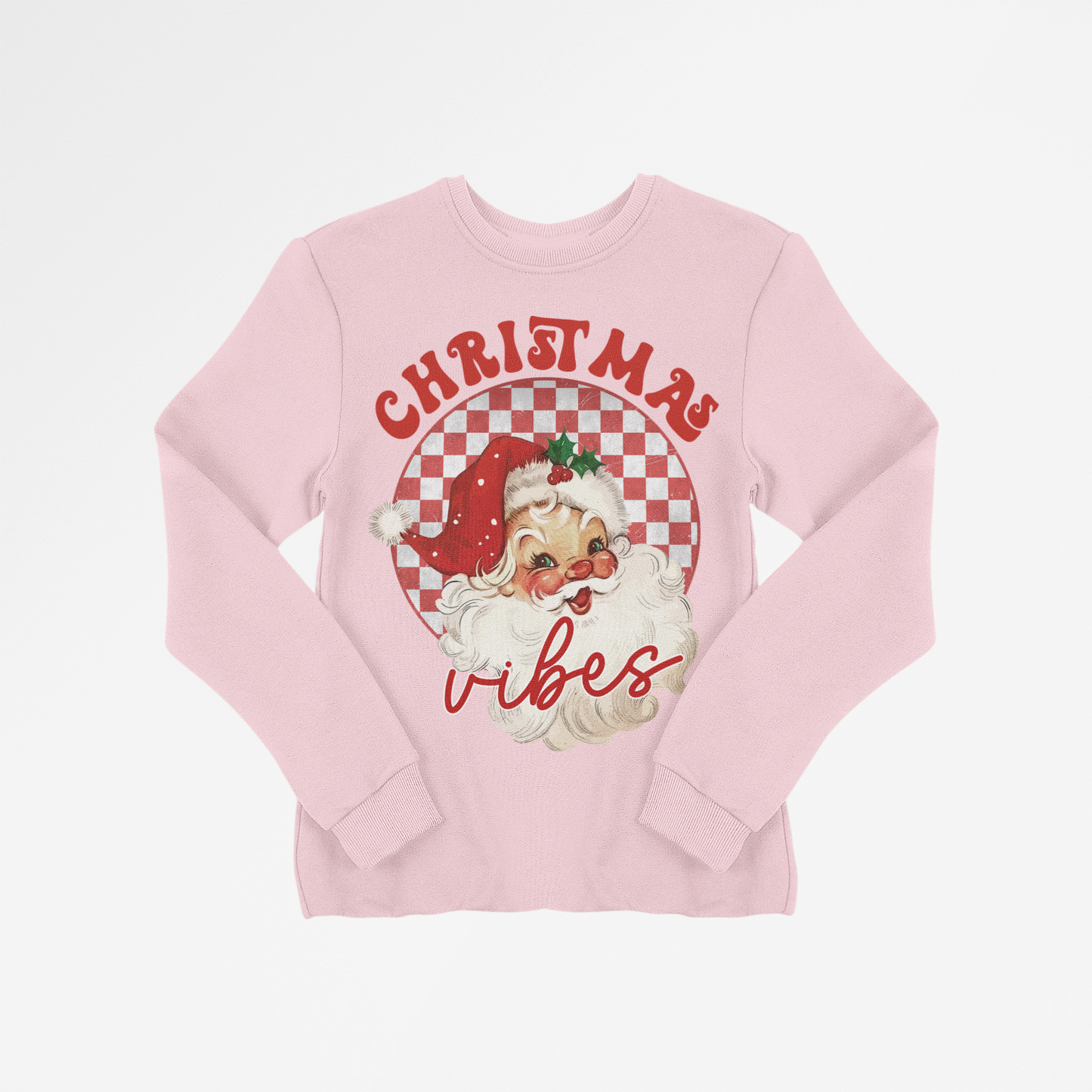 Pink long-sleeve shirt with Christmas-themed design featuring Santa Claus on a white background