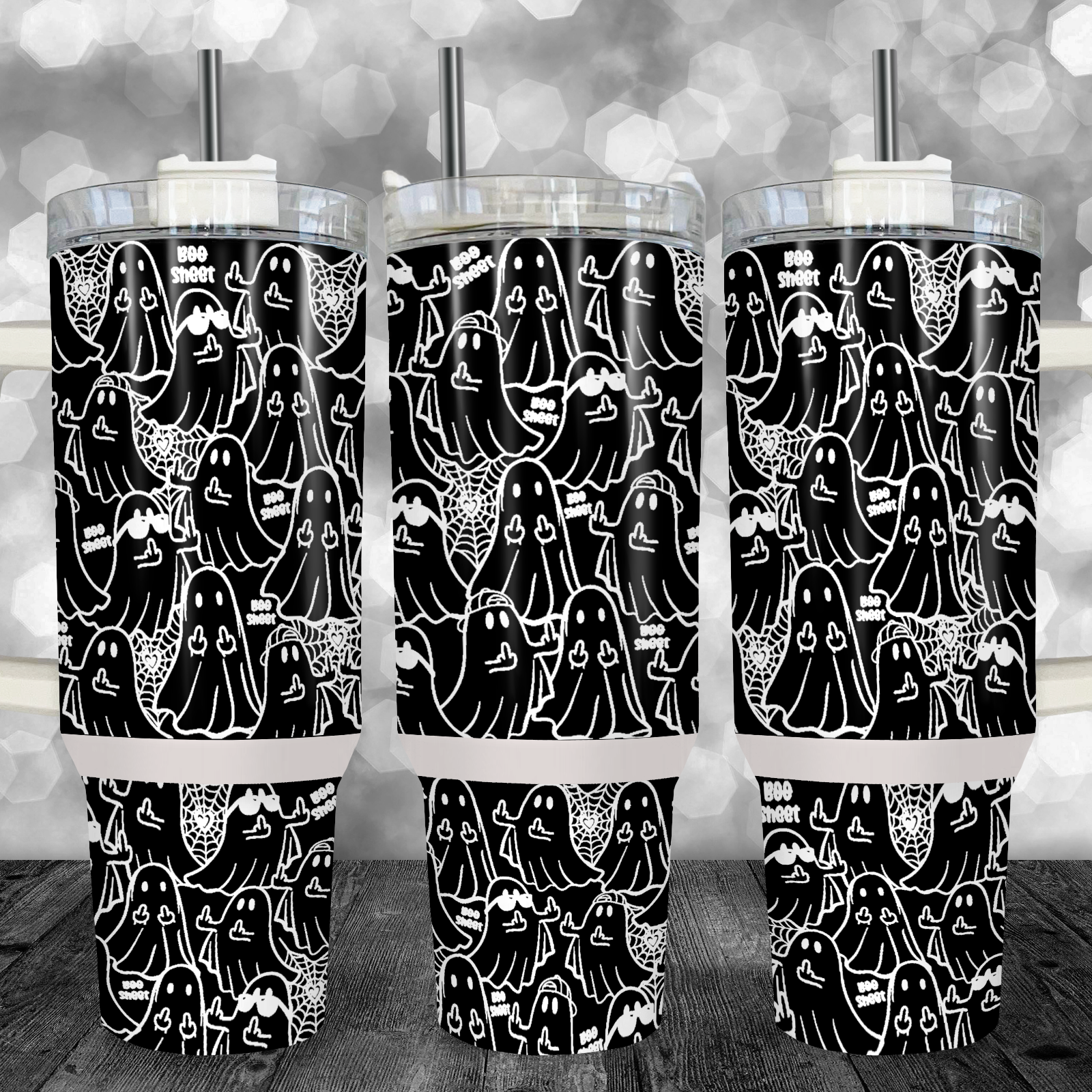 "40oz black Halloween tumbler with funny white ghost pattern and 'Boo Sheet' text, comes with handle, lid, and straw."