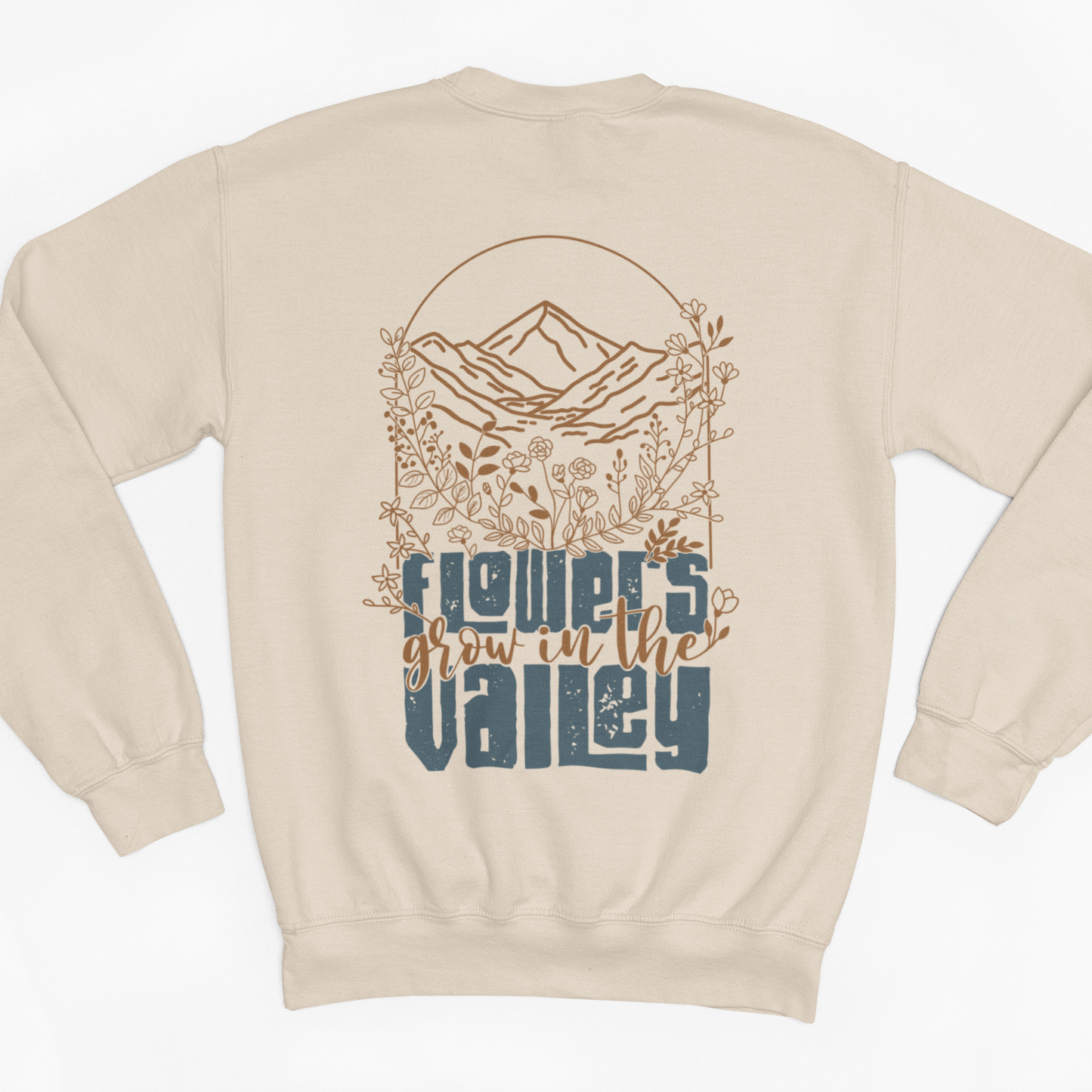 Beige sweatshirt with nature-themed design on a white background