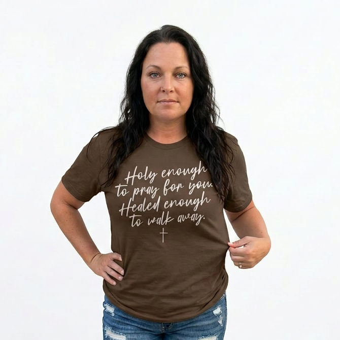 Woman wearing a brown t-shirt with text on a white background