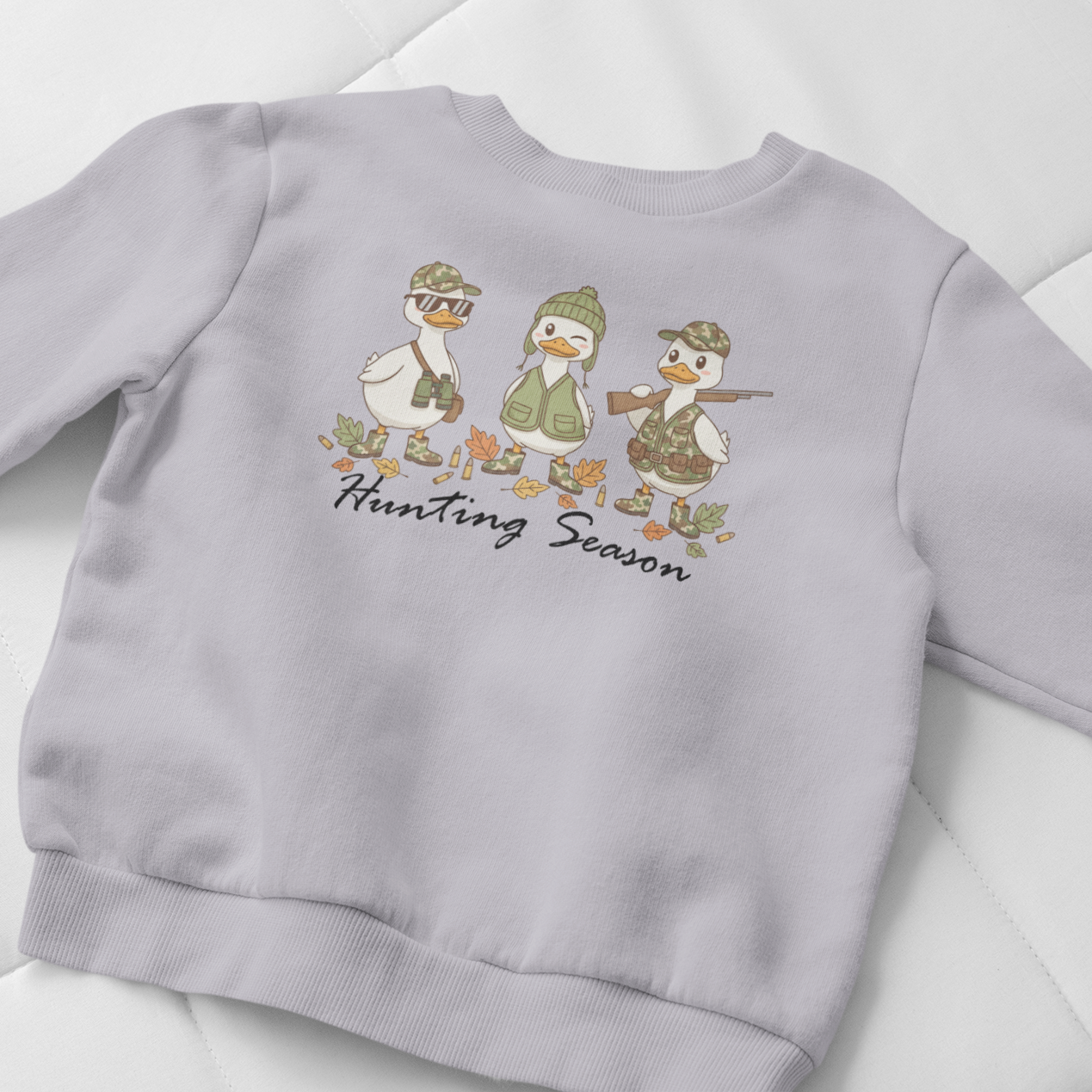 Gray sweatshirt with duck design and 'Hunting Season' text on a light gray background