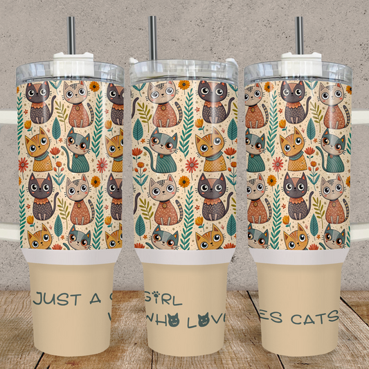 Three tumblers with cat pattern and 'Just a girl who loves cats' text on a wooden surface.