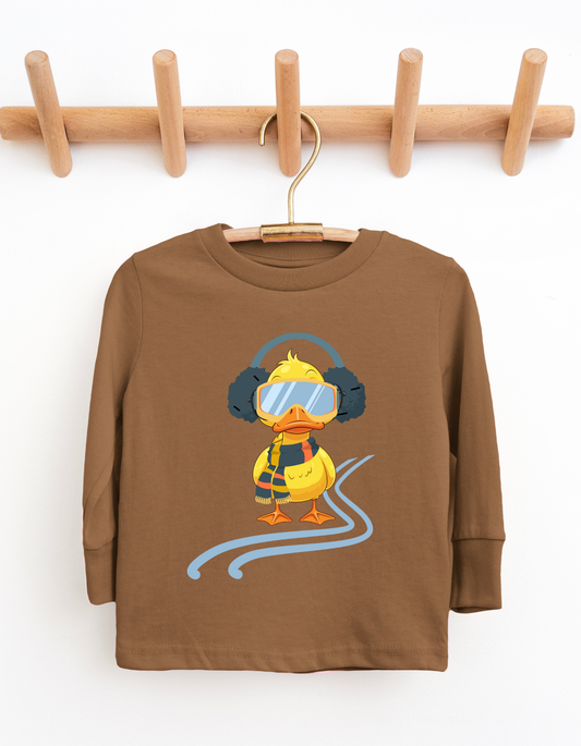 Brown children's long-sleeve shirt with a cartoon duck design on a wooden hanger against a white background.