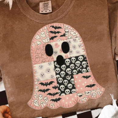 Brown t-shirt with a Halloween-themed ghost design on a checkered background