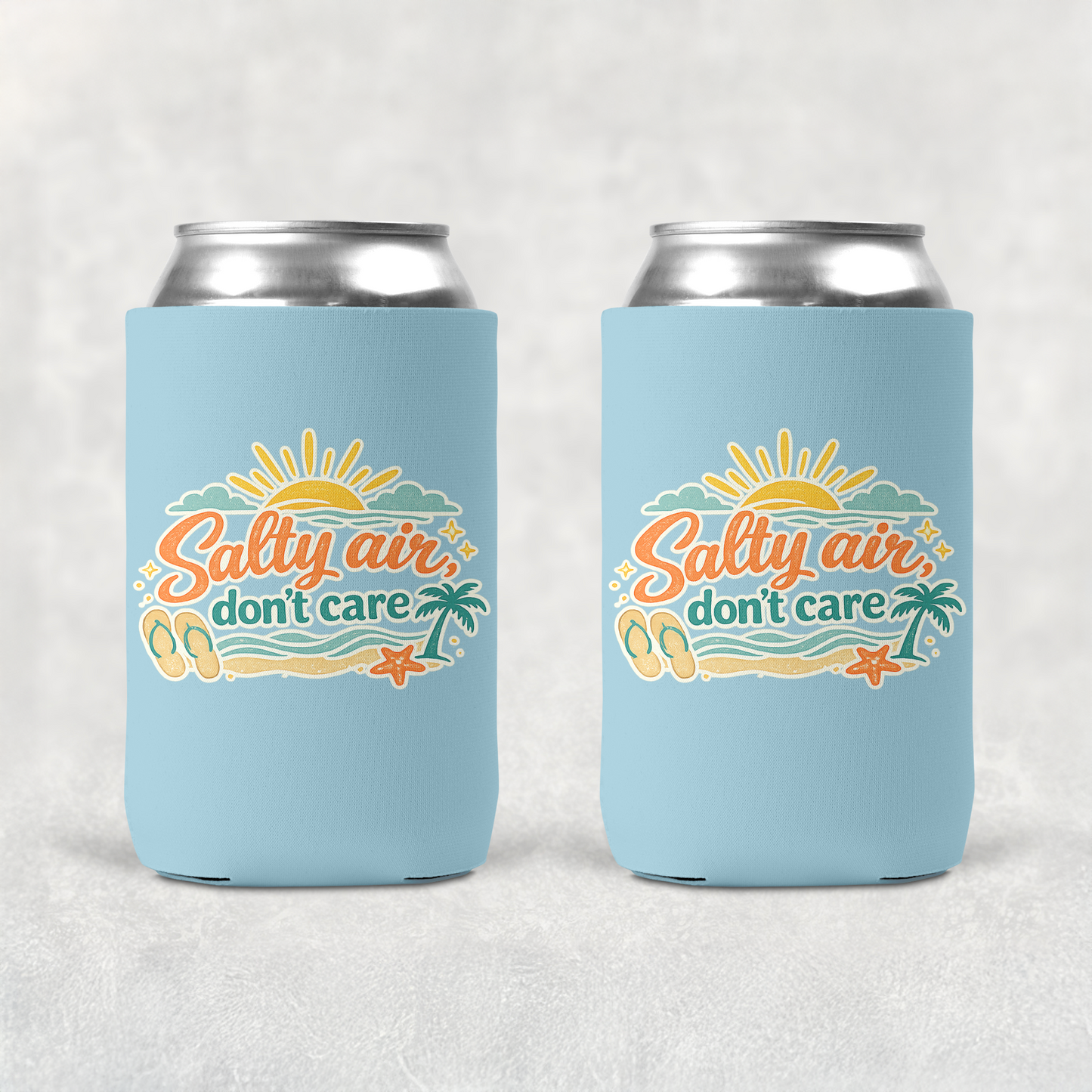 Two light blue can coolers with 'Salty air, don't care' design on a white background