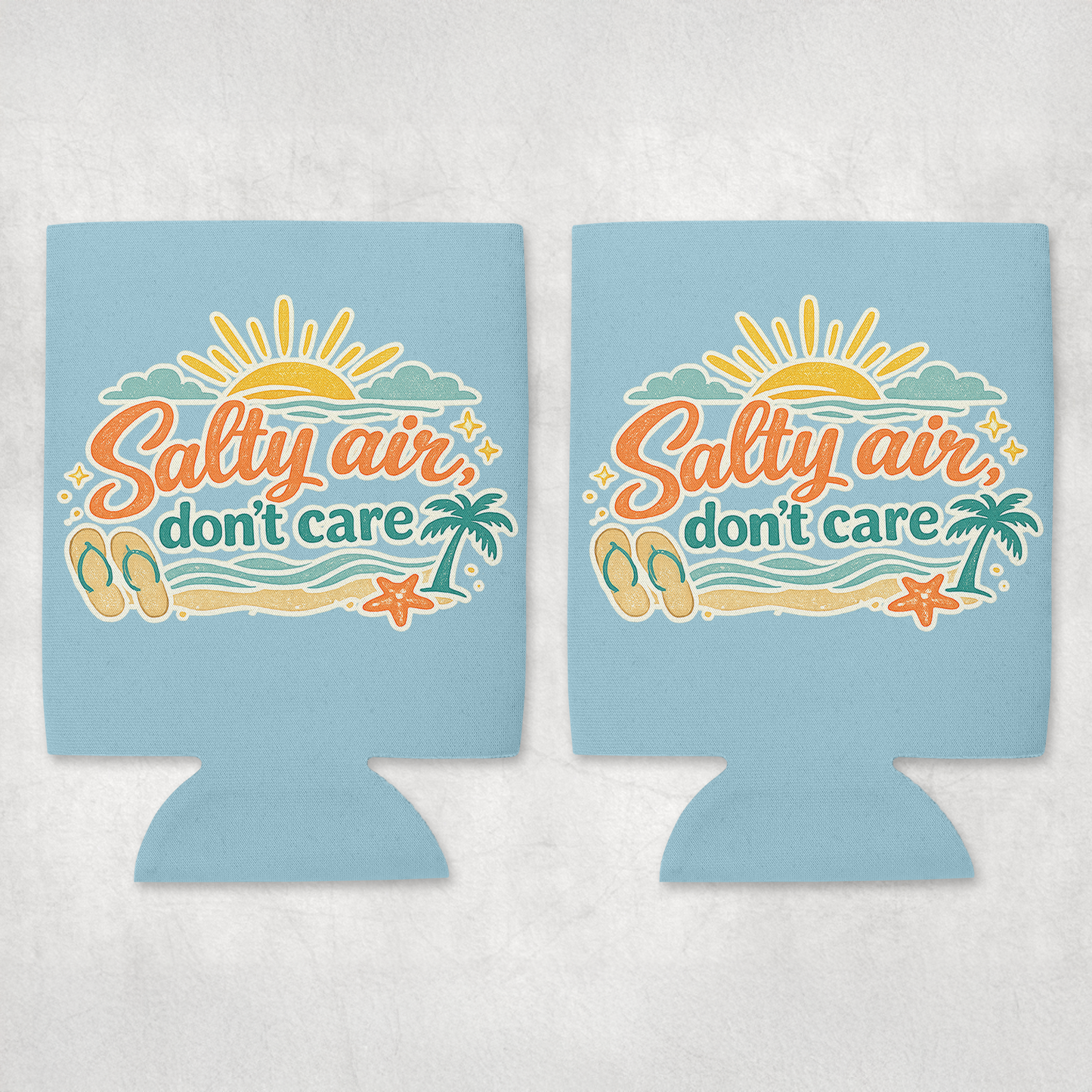 Two light blue can coolers with 'Salty air, don't care' design on a white background