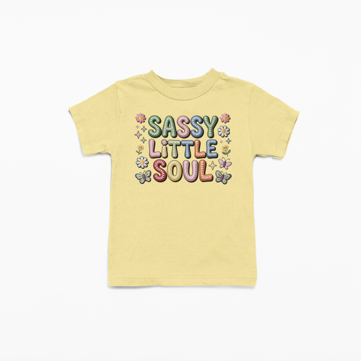 Yellow t-shirt with 'Sassy Little Soul' text and colorful graphics on a white background