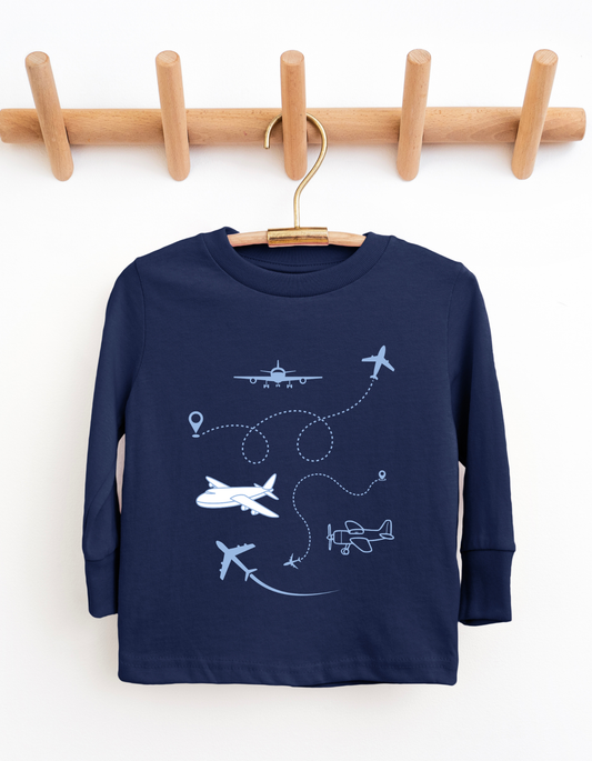Navy blue children's sweatshirt with airplane designs on a wooden hanger against a white background