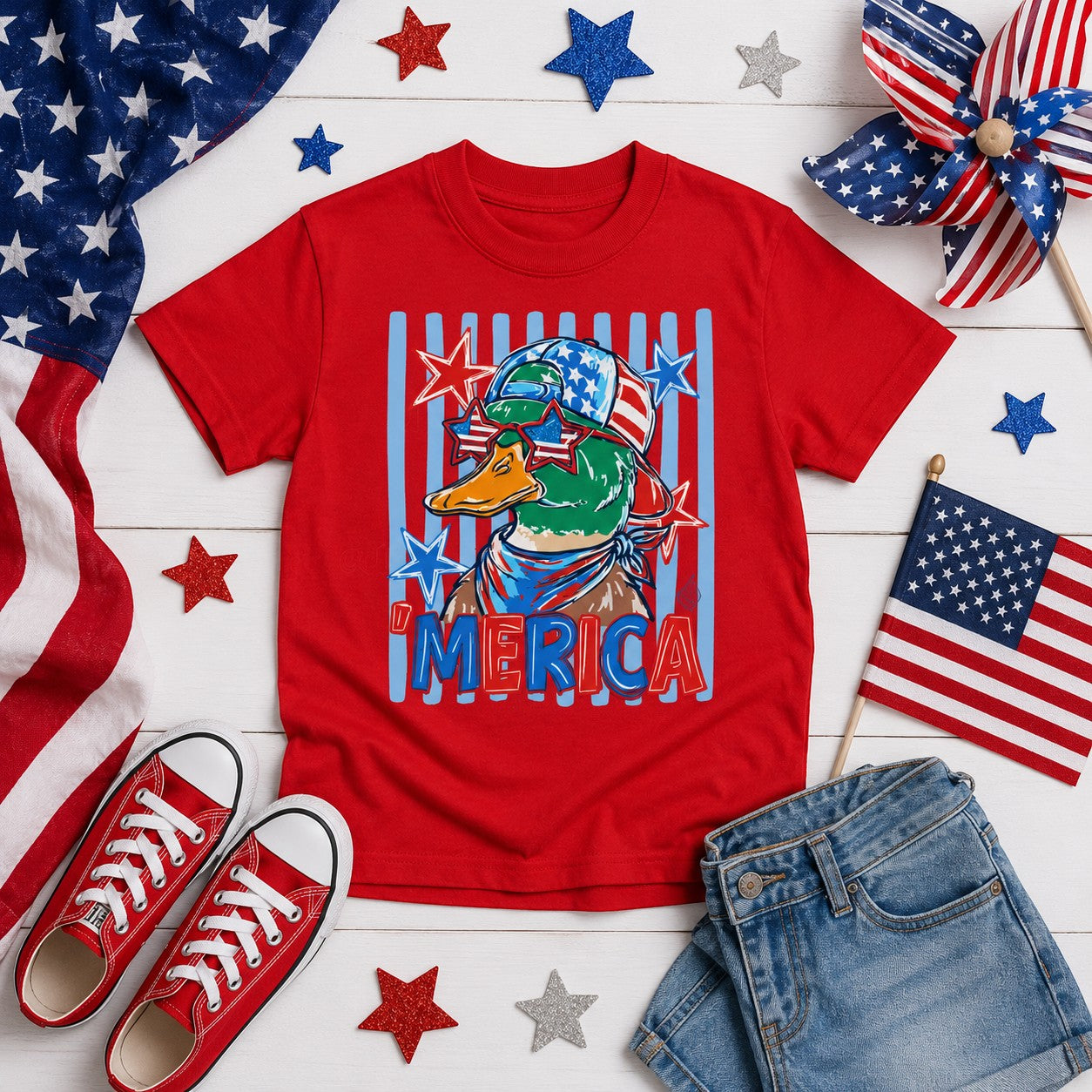 Tea Shirt Shoppe Wholesale red 100% cotton graphic tee with a duck wearing sunglasses and a bandana, saying "'MERICA".