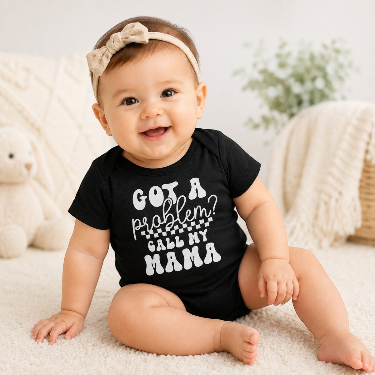 Tea Shirt Shoppe Wholesale black cotton infant bodysuit with Got A Problem Call My Mama text on a baby
