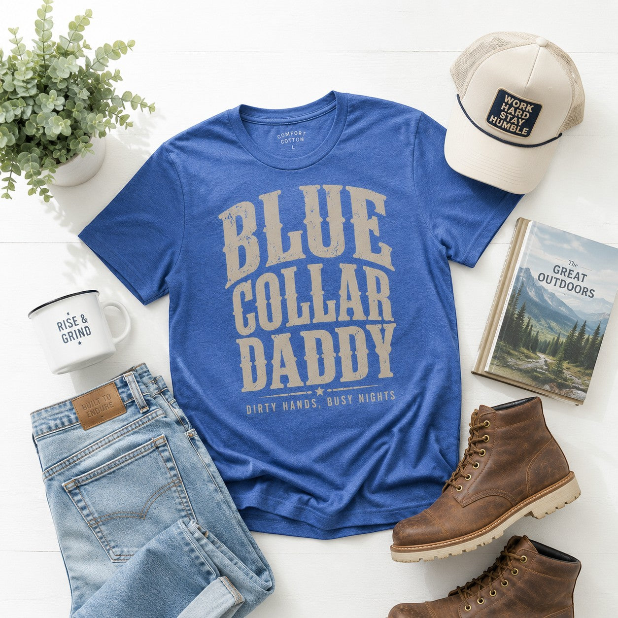 Tea Shirt Shoppe Wholesale blue graphic tee with "BLUE COLLAR DADDY" and "DIRTY HANDS, BUSY NIGHTS" text.