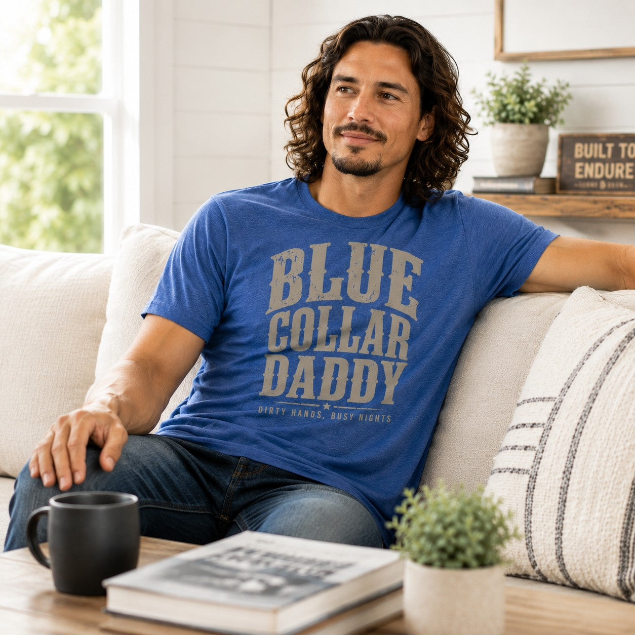 Tea Shirt Shoppe Wholesale blue heather graphic tee with "BLUE COLLAR DADDY" and "DIRTY HANDS, BUSY NIGHTS" text.