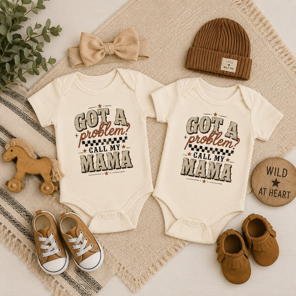 Tea Shirt Shoppe Wholesale cream infant bodysuits with Got a Problem Call My Mama graphic print and baby accessories.
