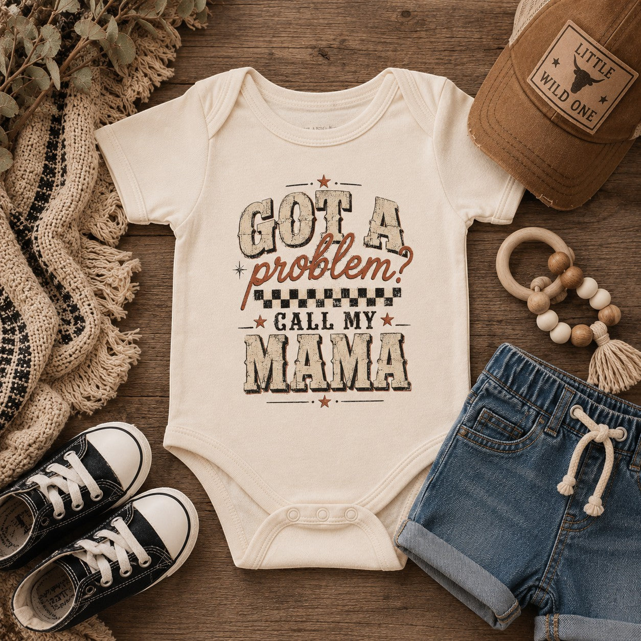 Tea Shirt Shoppe Wholesale cream infant bodysuit with Got a Problem Call My Mama vintage graphic and checkered detail