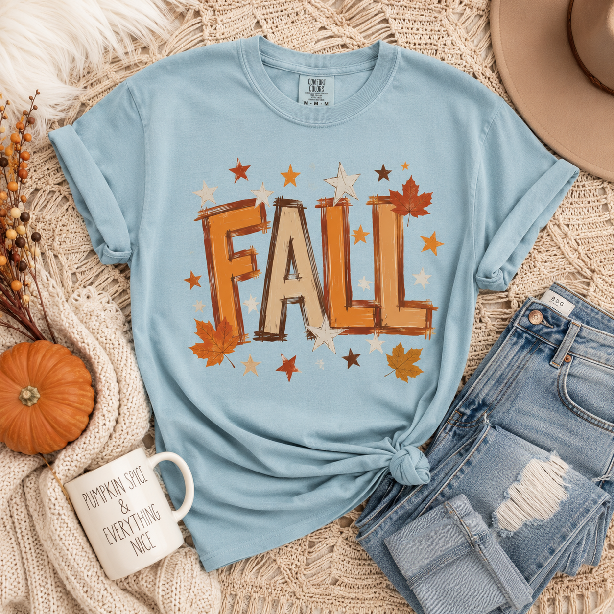 Tea Shirt Shoppe Wholesale light blue Comfort Colors graphic tee with Fall watercolor text and autumn leaves