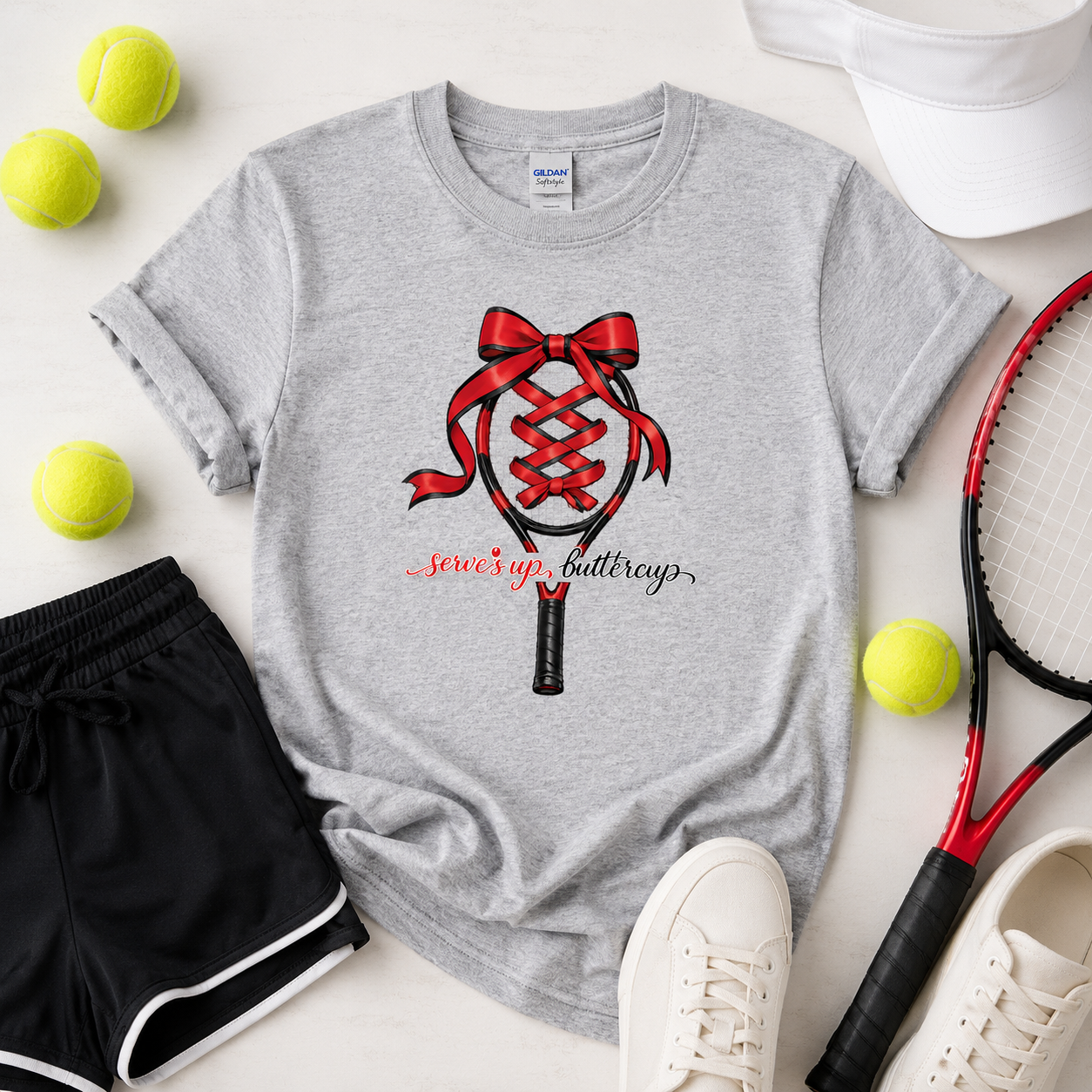 Tea Shirt Shoppe Wholesale sport grey Gildan graphic tee featuring a tennis racket with a red ribbon and text