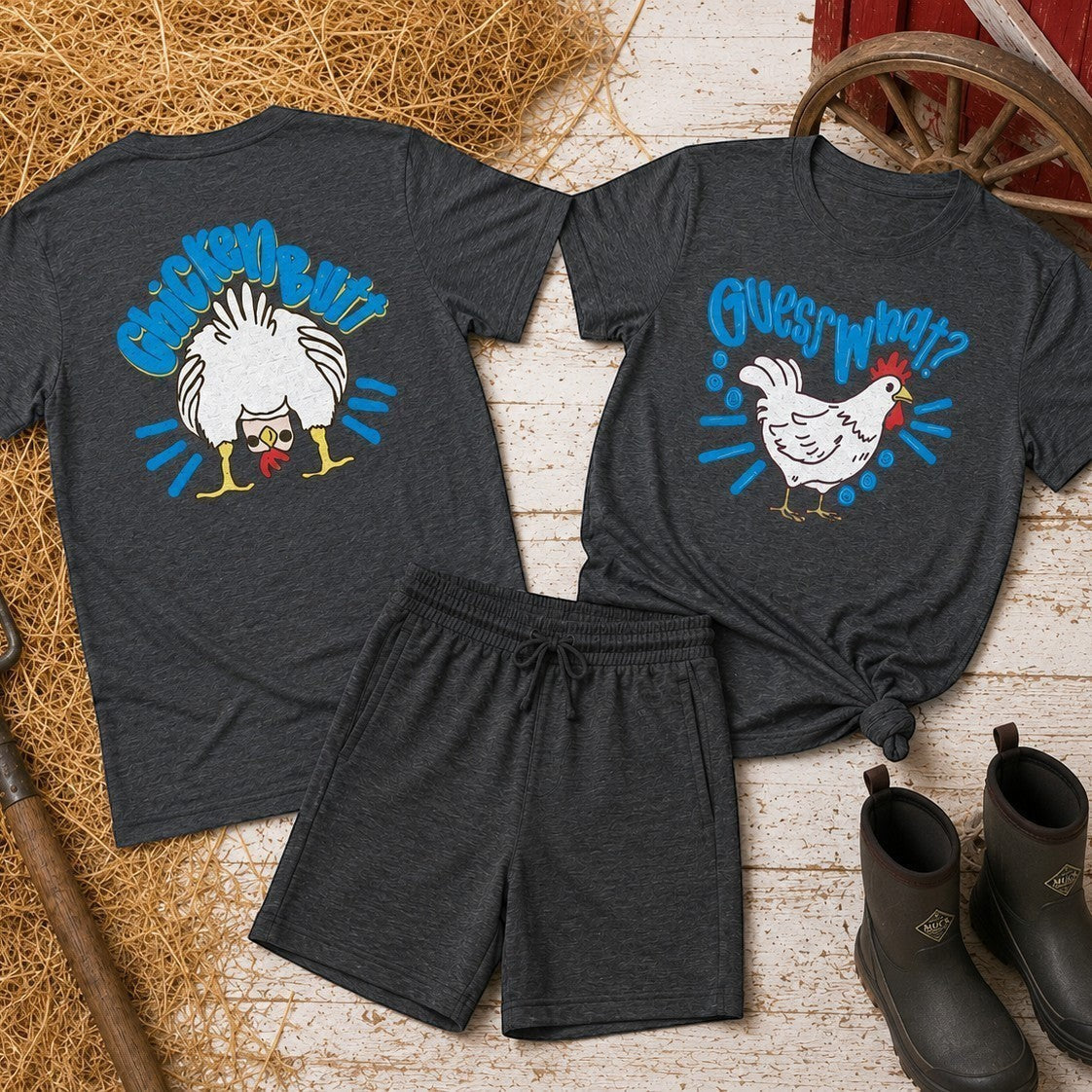 Tea Shirt Shoppe Wholesale dark heather grey 100% cotton graphic tee with a chicken and "Guess What?" text.