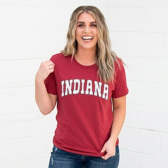 Tea Shirt Shoppe Wholesale red short sleeve cotton t-shirt with "INDIANA" graphic in white collegiate font with dotted fill.