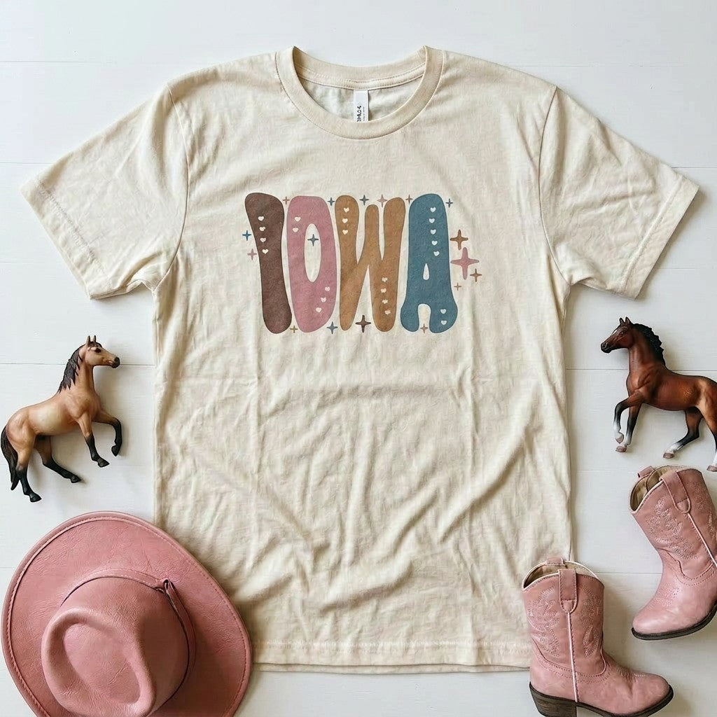 Tea Shirt Shoppe Wholesale Iowa retro graphic t-shirt in cream cotton blend with muted colors and heart details.