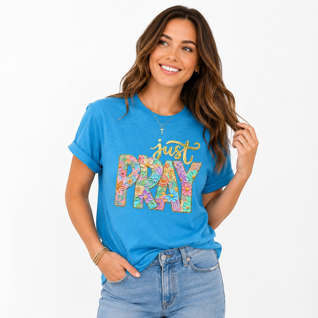 Tea Shirt Shoppe Wholesale blue 100% cotton graphic t-shirt with "just PRAY" floral lettering.