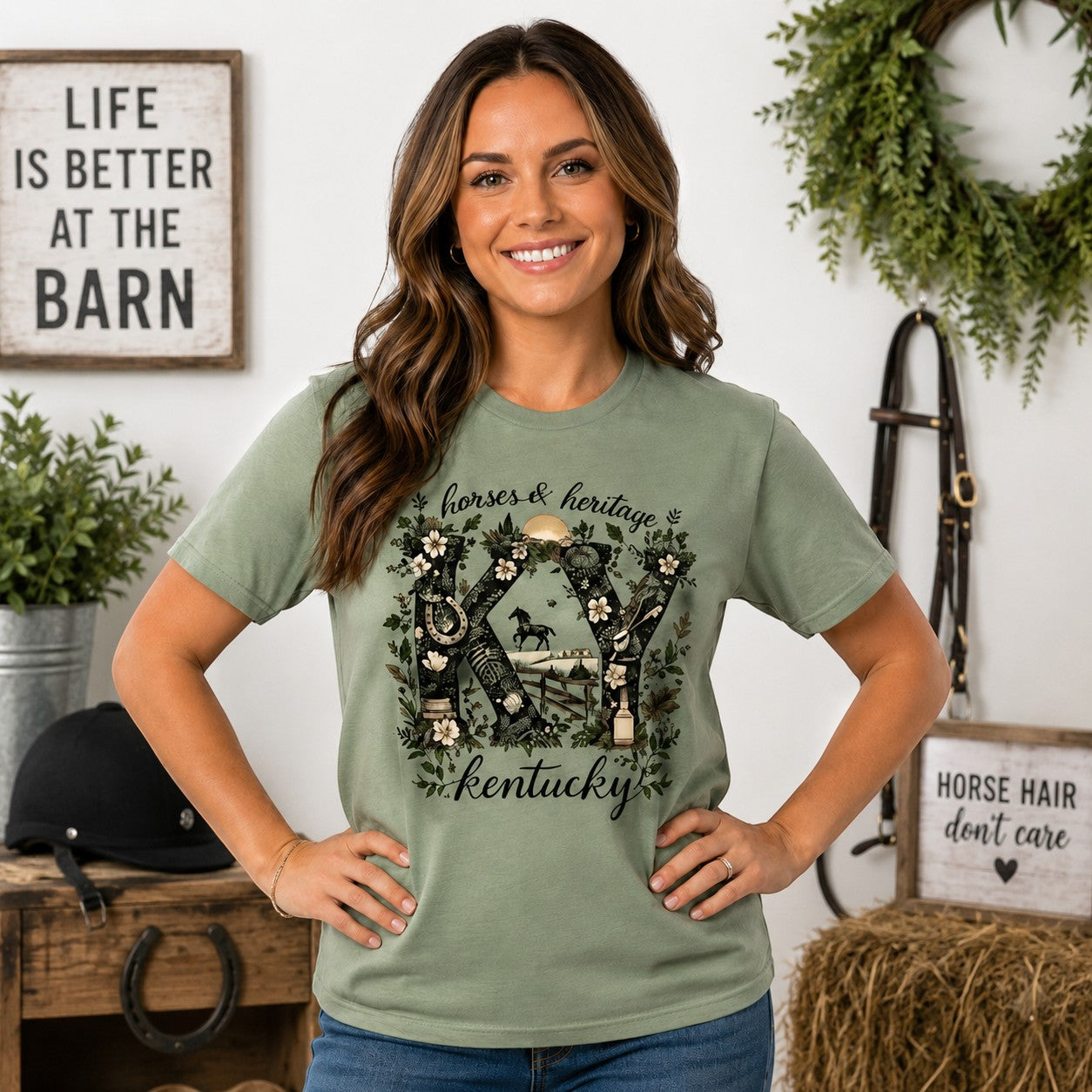 Tea Shirt Shoppe Wholesale sage green graphic tee featuring Kentucky horse heritage design on a smiling woman.