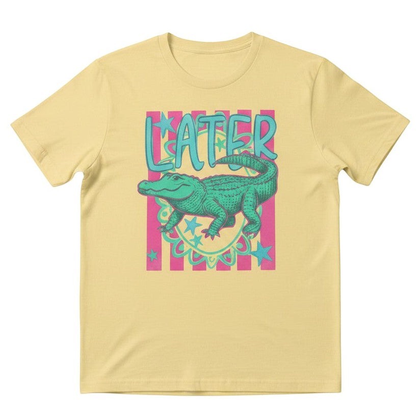 Tea Shirt Shoppe Wholesale yellow 100% cotton graphic tee with a green alligator and "Lator" text.