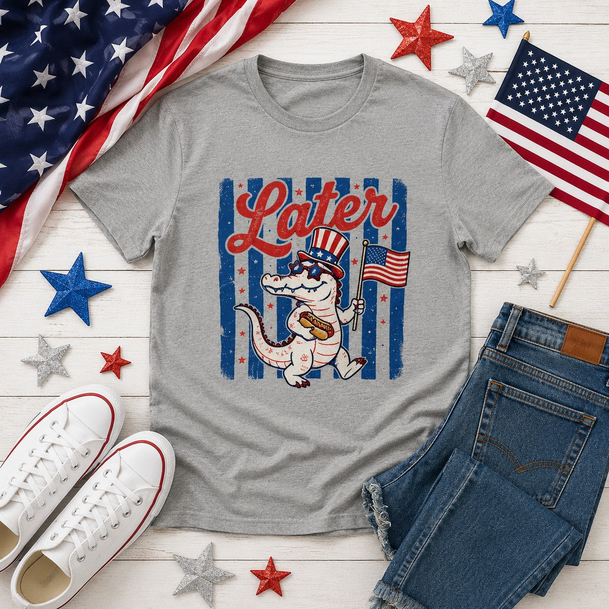 Tea Shirt Shoppe Wholesale heather grey youth graphic tee with alligator in Uncle Sam hat holding flag and hot dog.