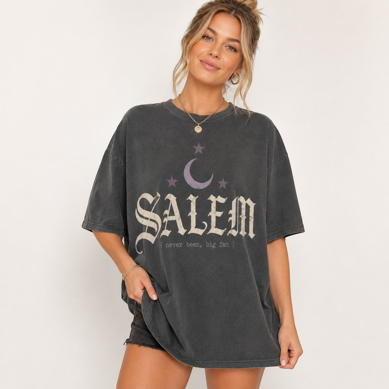 Tea Shirt Shoppe Wholesale charcoal grey Comfort Colors graphic tee with Salem moon and star print on a model