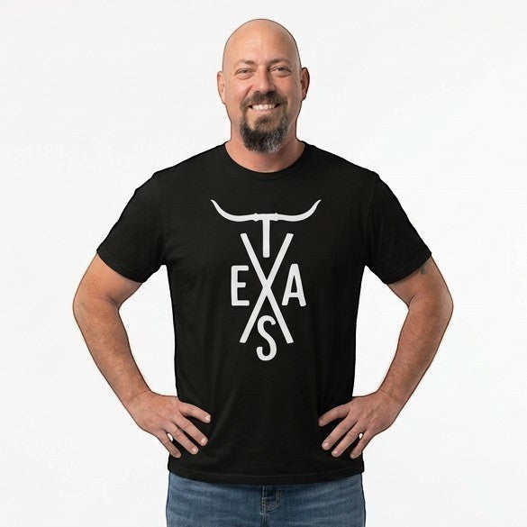 Tea Shirt Shoppe Wholesale black graphic t-shirt with white Texas Longhorn and TEXAS text graphic. Short sleeves, crew neck.