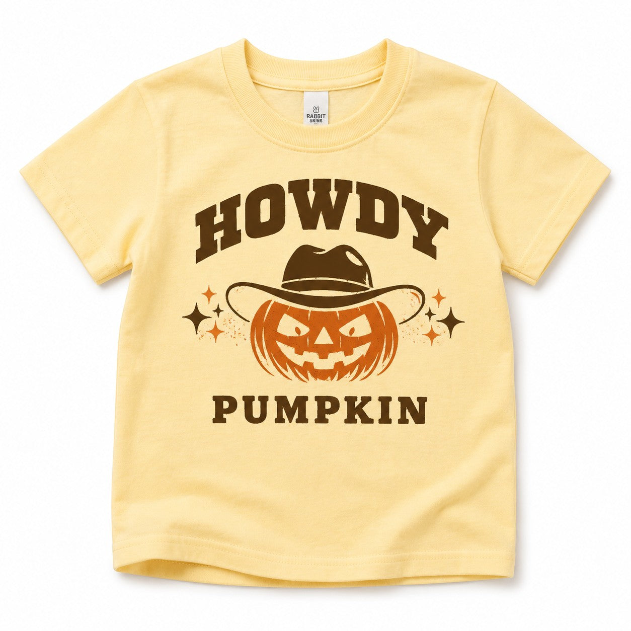 Tea Shirt Shoppe Wholesale buttery yellow graphic tee featuring a jack-o'-lantern wearing a cowboy hat for Halloween.